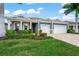 Beautiful two-story house with landscaping at 5565 Long Shore Loop, Sarasota, FL 34238