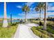 Community grilling area with tables and seating at 5565 Long Shore Loop, Sarasota, FL 34238