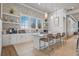 Modern kitchen in community clubhouse with granite countertops at 5565 Long Shore Loop, Sarasota, FL 34238