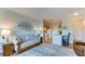 Bright living room features comfy sofa, large windows, and tasteful decor at 210 3Rd W St # 8407, Bradenton, FL 34205