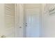 Bright entryway with white doors and louvered shutters at 210 3Rd W St # 8407, Bradenton, FL 34205