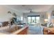 Open kitchen with stainless steel sink and breakfast bar at 210 3Rd W St # 8407, Bradenton, FL 34205