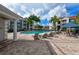 Resort-style pool with lounge chairs and shaded seating at 210 3Rd W St # 8407, Bradenton, FL 34205