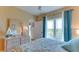 Bedroom with large windows offering ample natural light at 210 3Rd W St # 8407, Bradenton, FL 34205