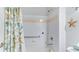 Bathroom with tub, shower, and grab bars for accessibility at 210 3Rd W St # 8407, Bradenton, FL 34205