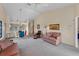 Open living room features ample natural light and comfortable seating at 3920 Bal Harbor Blvd # D8, Punta Gorda, FL 33950