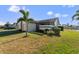 Charming house exterior with well-manicured lawn at 3920 Bal Harbor Blvd # D8, Punta Gorda, FL 33950