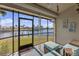 Relaxing screened porch overlooking the water with comfy seating at 3920 Bal Harbor Blvd # D8, Punta Gorda, FL 33950