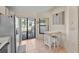 Kitchen features breakfast nook and sliding door to patio at 3920 Bal Harbor Blvd # D8, Punta Gorda, FL 33950