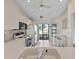 Kitchen with breakfast bar and access to patio at 3920 Bal Harbor Blvd # D8, Punta Gorda, FL 33950