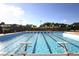 Inviting community pool with lane lines and diving boards at 13853 Siena Loop, Lakewood Ranch, FL 34202
