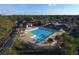 Resort-style pool with expansive sundeck and clubhouse at 13853 Siena Loop, Lakewood Ranch, FL 34202