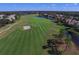 Expansive green golf course with sand traps at 13853 Siena Loop, Lakewood Ranch, FL 34202