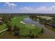 Aerial view of golf course and residential area at 13853 Siena Loop, Lakewood Ranch, FL 34202