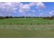 Golf driving range with multiple tee stations at 13853 Siena Loop, Lakewood Ranch, FL 34202