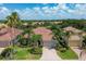 Bird's-eye view of a community of homes, showcasing various architectural styles at 13853 Siena Loop, Lakewood Ranch, FL 34202
