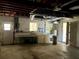 Basement with laundry hookups, storage, and work area at 6613 Blue Heron S Dr, St Petersburg, FL 33707