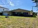A single-story home with an attached garage and front yard at 6613 Blue Heron S Dr, St Petersburg, FL 33707