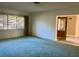Bedroom with carpet, neutral paint, and large windows at 6613 Blue Heron S Dr, St Petersburg, FL 33707