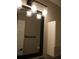 Bathroom with mirror and light fixture at 2411 Aspinwall St # 2411, Sarasota, FL 34237