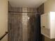 Updated bathroom with new tile, fixtures, and a modern vanity at 2411 Aspinwall St # 2411, Sarasota, FL 34237