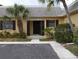 Condo entrance with well manicured landscaping at 2411 Aspinwall St # 2411, Sarasota, FL 34237