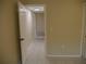 A hallway with tile flooring and access to other rooms at 2411 Aspinwall St # 2411, Sarasota, FL 34237