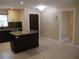 Eat-in kitchen with island and plenty of cabinet space at 2411 Aspinwall St # 2411, Sarasota, FL 34237