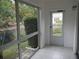 Screened patio with access to backyard and canal view at 2411 Aspinwall St # 2411, Sarasota, FL 34237