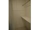 Empty closet with a shelf and hanging rod at 2411 Aspinwall St # 2411, Sarasota, FL 34237