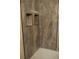 Walk-in shower with contemporary tile and fixtures at 2411 Aspinwall St # 2411, Sarasota, FL 34237