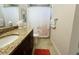 Bathroom with granite countertop and shower/tub combo at 395 Aruba Cir # 102, Bradenton, FL 34209