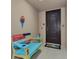 Bright and airy entryway with decorative bench and view to living area at 395 Aruba Cir # 102, Bradenton, FL 34209