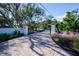 Paved driveway with gated entry to a beautiful beach home at 7730 Manasota Key Rd, Englewood, FL 34223