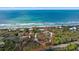 Oceanfront property with expansive beach views and lush landscaping at 7730 Manasota Key Rd, Englewood, FL 34223