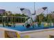 Unique playground with bird-themed equipment at 750 N Tamiami Trl # 1115, Sarasota, FL 34236
