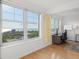 Home office with water views and plenty of natural light at 750 N Tamiami Trl # 1115, Sarasota, FL 34236