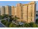 Luxury high-rise building with pool and fountain at 750 N Tamiami Trl # 1115, Sarasota, FL 34236