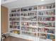 Well-stocked library with floor-to-ceiling bookshelves at 750 N Tamiami Trl # 1115, Sarasota, FL 34236