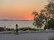 Stunning sunset over the bay, viewable from a relaxing seating area at 750 N Tamiami Trl # 1115, Sarasota, FL 34236