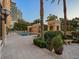 Inviting resort-style pool with lounge chairs and lush landscaping at 750 N Tamiami Trl # 1115, Sarasota, FL 34236