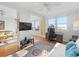 Living area features water views and a workspace at 750 N Tamiami Trl # 1115, Sarasota, FL 34236
