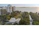 Aerial view of waterfront park and high-rise buildings at 750 N Tamiami Trl # 1115, Sarasota, FL 34236