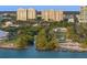 Aerial view of waterfront property with park and high rises at 750 N Tamiami Trl # 1115, Sarasota, FL 34236
