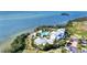 Aerial view of community, pool, and waterfront at 395 Aruba Cir # 102, Bradenton, FL 34209