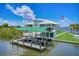 Waterfront home with private dock and boat lift; expansive backyard at 327 Riverpoint Ne Dr, Bradenton, FL 34208