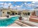 Amazing screened pool and spa with lounge chairs and outdoor seating at 6915 Chancery Pl, University Park, FL 34201