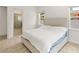 Spacious bedroom with ensuite bathroom access at 1800 Robinhood St, Sarasota, FL 34231