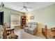 Cozy den with recliner, small table and built-in shelving at 4215 Caddie E Dr # 101, Bradenton, FL 34203