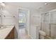 Bathroom with shower, toilet and vanity with granite countertop at 4215 Caddie E Dr # 101, Bradenton, FL 34203
